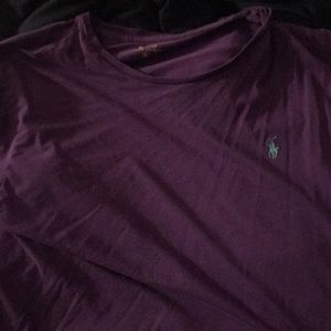 A purple and light blue polo tee shirt